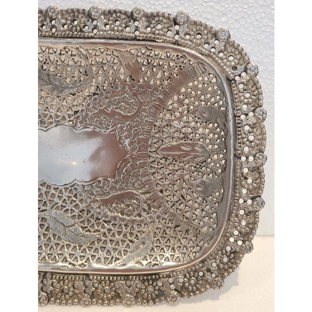 Unmarked handmade footed pierced silver plate dish in excellent condition.
