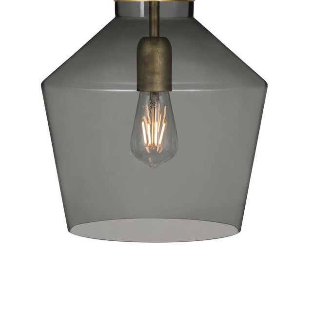 Ceiling lamp model fenomen widh designed by sabina grubbeson and manufactured by konsthantverk. the production of lamps,...