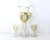An antique blown, frosted glass lemonade or water pitcher and two glasses, hand-painted with a green neoclassical wreath...