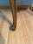 Simply elegant and functional Baker Furniture walnut burl side table. Features a beautifully scalloped apron with cabriole...
