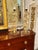 The product is a pair of gold Murano glass ball form lamps. These lamps are designed with a sleek and modern look, perfect...