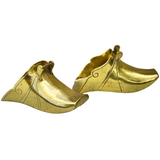 Spectacular, rare and very heavy antique pair of horse stirrups meticulously handcrafted of solid brass in an elaborate...
