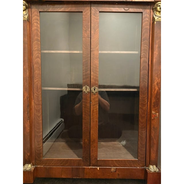 This exceptional 19th-century French Empire bibliothèque (bookcase) is a sophisticated example of Neoclassical design,...