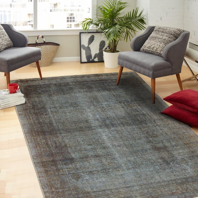 Elevate your home with the timeless beauty of a handmade Persian rug, renowned for its exceptional craftsmanship, rich...