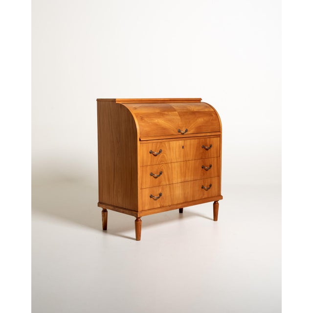 Elm writing desk with flap, internal compartments, and three large drawers with metal handles. Scandinavian production,...