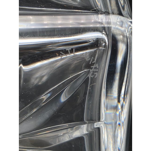 A clear cut crystal decanter bottle, signed Atlantis, a Portuguese manufacturer known for its quality crystal. Square in...