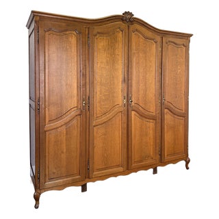 Vintage French Louis XVI Style Carved Oak 4-Door Wardrobe For Sale