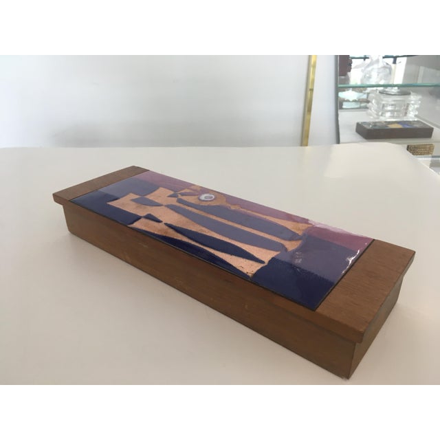 Mid Century rectangular box with enamel on copper lid. The abstract geometric design on the lid is pink, violet and cobalt...