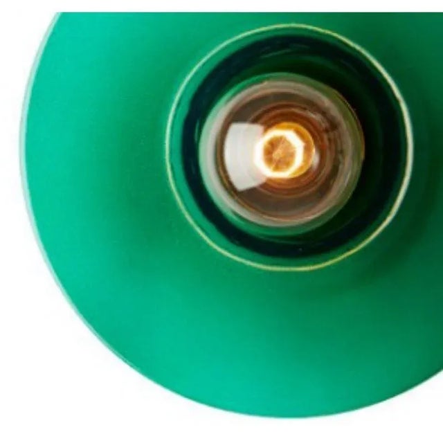 Green alvéole wall light by radar materials: translucent thermoformed glass, metal. Dimensions: depth 15 x diameter 27 cm...