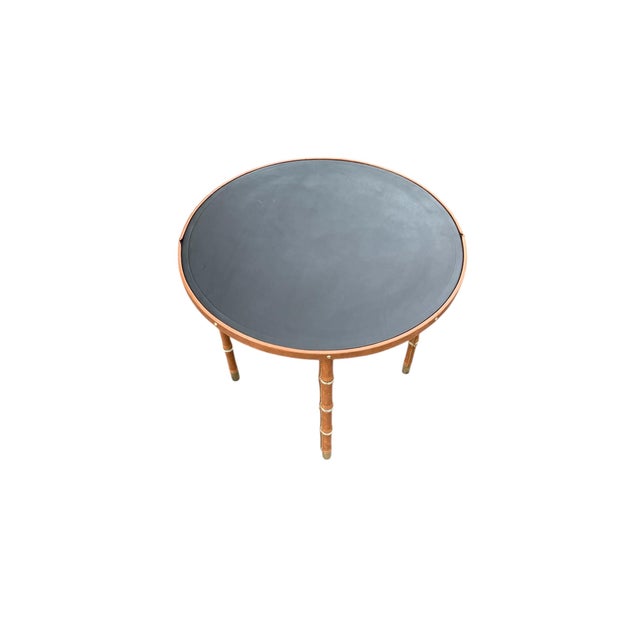 Stitched Leather Side Table by Jacques Adnet, 1950s, in Good conditions. Designed 1950 to 1959 This piece has an...