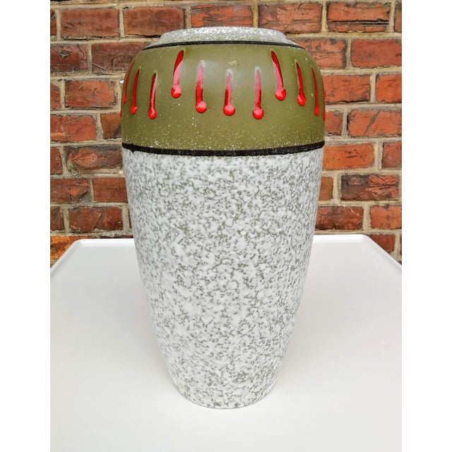 A large decorative vase, colored with a converging glaze - this is a technique developed by the outstanding Polish artist...