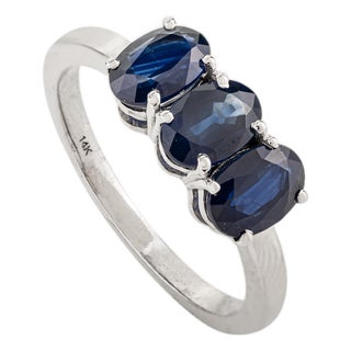 Modern 2 Carat Oval Cut Deep Blue Sapphire Three Stone Ring in 14k White Gold Size 6.5 For Sale