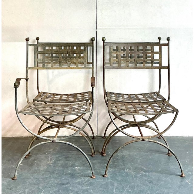 Presenting a remarkable set of four vintage dining chairs after the acclaimed Maurizio Tempestini, embodying a captivating...