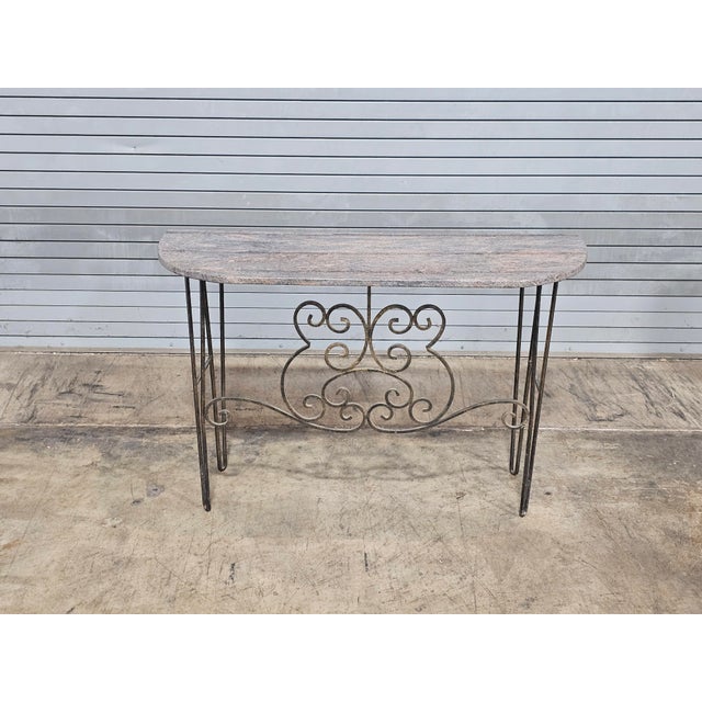Store Item: Wrought Iron Designer Base with Granite Top Console Table Description: Curved top shaped table with solid...