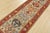 A traditional tribal Caucasian Kazak runner hand-knotted with an all-wool pile on a cotton foundation. This oriental rug...