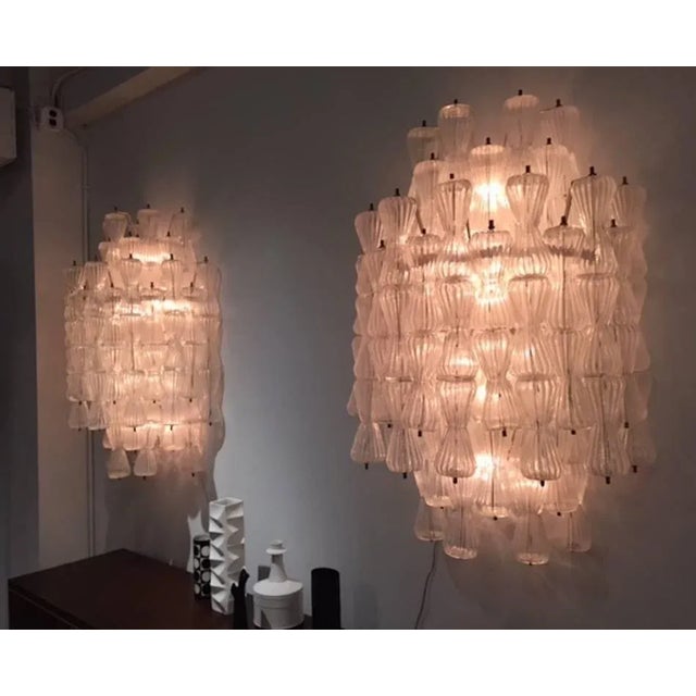 A very rare and unique pair of large sconces by famous glass house Barovier & Toso, circa 1960. Each sconce is made up of...