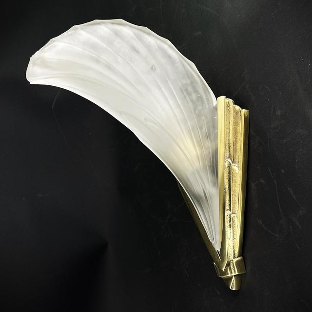 This rare wall sconce captivates with its simple and functional art deco design. The wall sconce demonstrates outstanding...