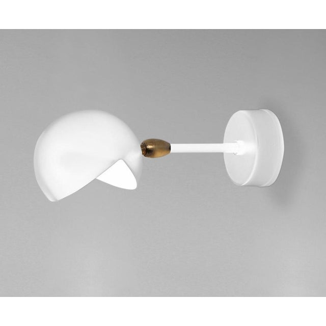 Sconce wall lamp model 'eye wall lamp' designed by serge mouille in 1956. Manufactured by editions serge mouille in...