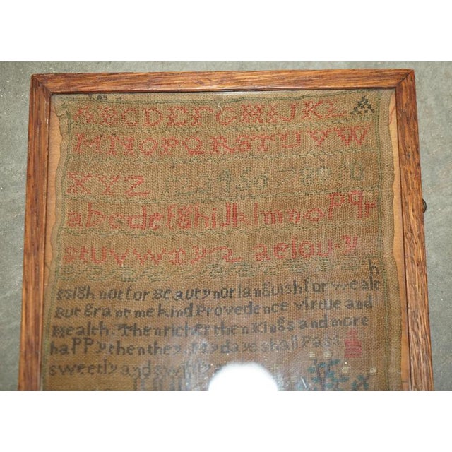 Early 19th Century 1824 dated English Needlework Sampler by Ann Yates, Aged 12, Ravenhead A wonderfully characterful early...