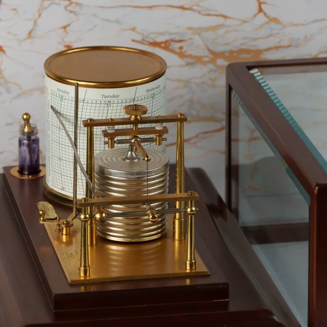 An elegant Short &amp; Mason barograph, serial number C2663, manufactured in London and housed in a polished mahogany case...