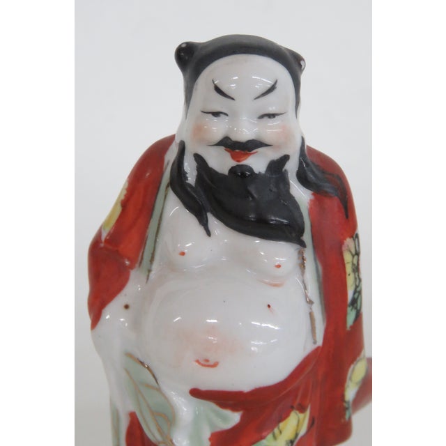 This wonderful Small Taoist Figurine is made of porcelain. This amazing decorative piece depicts of one of the legendary...