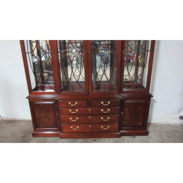Item: Thomasville Breakfront Details: Breakfront Chippendale Traditional Design Brass Gallery Signed Thomasville Mahogany...