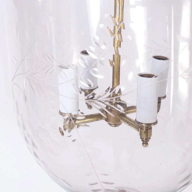 Antique smoke bell light fixture or lantern crafted in hand blown cut glass in classic form and having brass hardware.