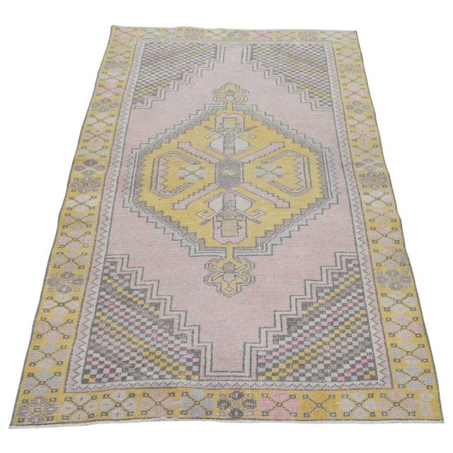 Hand-knotted with care using traditional rug-making techniques, this wool rug blends timeless craftsmanship with a modern...