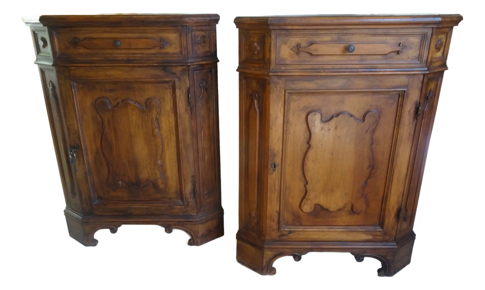 Pair of dark brown 18th century Italian corner cabinets side by side.