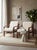 A rare and collectible matching pair of fully refurbished mid-century modern lounge armchairs designed by renowned...