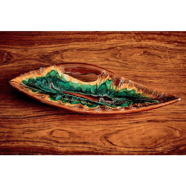 This sculptural ceramic dish comes from Vallauris, France —a postwar center of studio pottery where utility objects were...