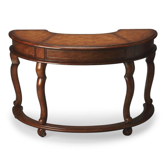 Leather top and apron with three working drawers. Select solids, veneers and resin components. Durably Constructed With:...