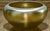 A luminous and beautifully preserved Steuben Gold Aurene Rolled Rim Bowl, shape No. 2687, created during the highly...