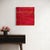 Two faint concentric circles trace themselves across a rich field of crimson and burgundy, the paint applied in soft,...