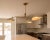 Sculptural Three-Light Brass Chandelier With White Domed Shades For Sale - Image 6 of 10