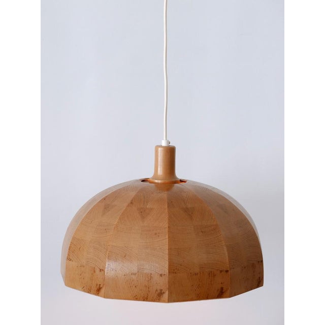 Extremely rare, elegant highly decorative mid-century modern pendant lamp or hanging light. Designed & manufactured in...