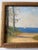 Unsigned impressionist-style lakeshore scene. Oil on board, circa 1920-1940. Presented in an antique gold frame.