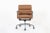 This authentic Eames for Herman Miller Soft Pad Management height brown office chair from the Aluminum Group Collection...
