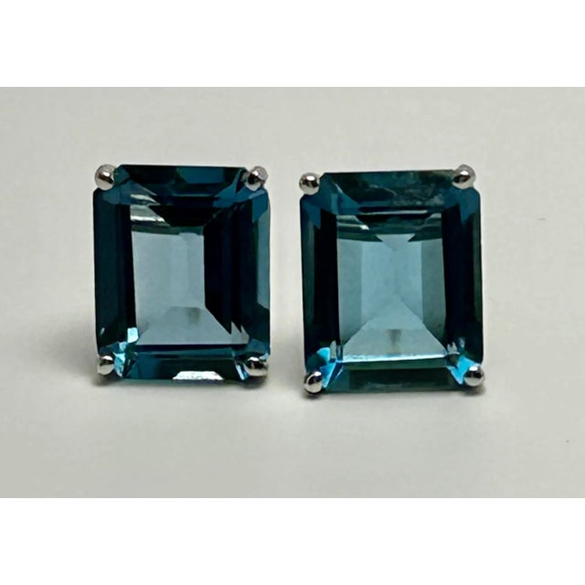 Please revise the materials field to account for all materials present. Pair of 14k (Tested) White Gold & Emerald Cut...
