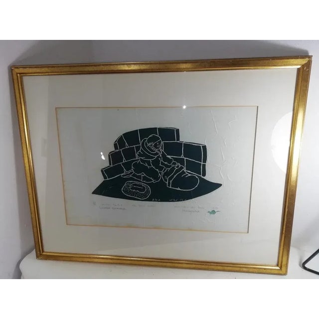 Beautiful woodcut by Lucassie Qumaluk printed in the town of Povungnituk. This work represents, in a highly lyrical...