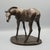 A charming bronze sculpture of a foal with head turned by john rattenbury skeaping. Signed and numbered 8/20. Dimensions:...