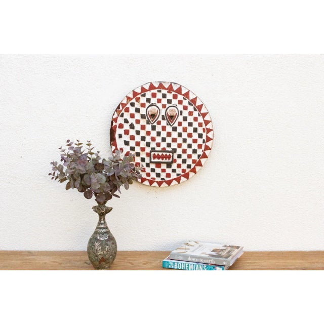 This lovely vintage Bobo sun mask is a must-have for collectors and enthusiasts of tribal culture. Hand-carved from wood...