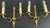 A charming pair of Vintage French sconces featuring elegant twin arms and beautifully detailed decorative styling. These...