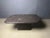 Brutalist slate and natural stone top coffee table with inlaid copper and brass. Brown/black colour stone mounted on a...