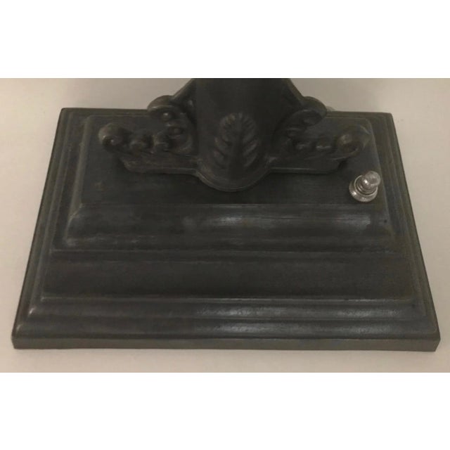 Art Deco-Empire inspired hooded desk/task lamp. Switch on stepped base with coved detail to rest writing instrument. Two...