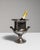 This mid 20th century ice bucket from France is finished in silver. Its form follows honest, well-proportioned lines...