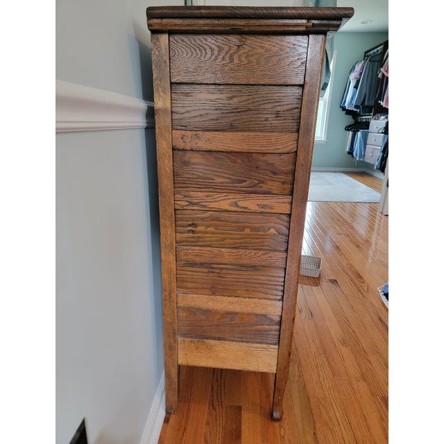 Offered here is one piece from a long-preserved American quarter-sawn tiger oak bedroom suite dating to approximately...