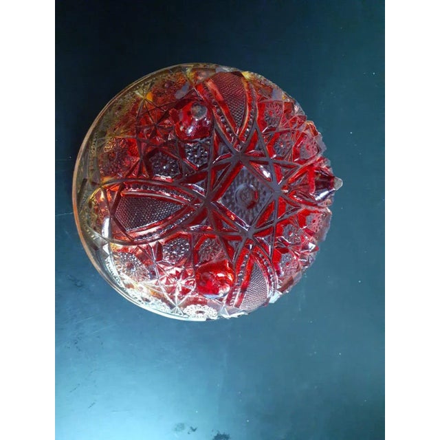 This is a Vintage Jeannette Amberina Glass 7" Decorative Pedestal Bowl. Procured at an auction.