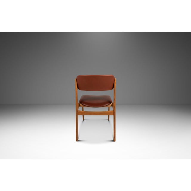 This exceptional set of six Model 49 dining chairs by Erik Buch for O.D. Møbler, crafted in Denmark during the 1960s...