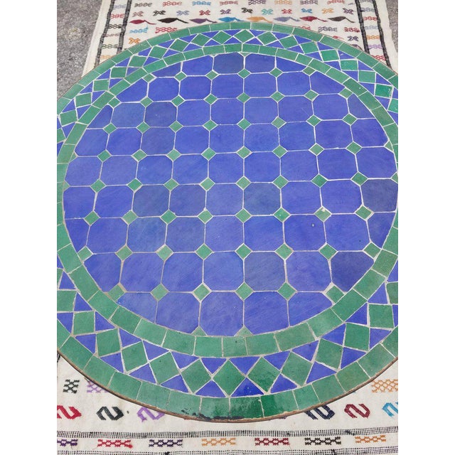 100 % glazed round. Blue and green Moroccan mosaic table measuring approximately 24″ in diameter. For both indoors and...